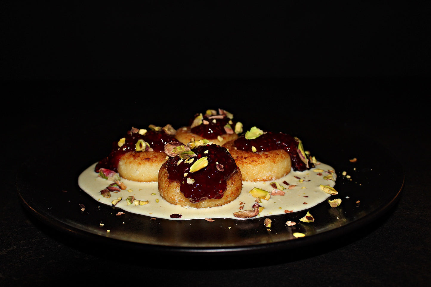Cottage cheese scones with pistachio cream and raspberry sauce