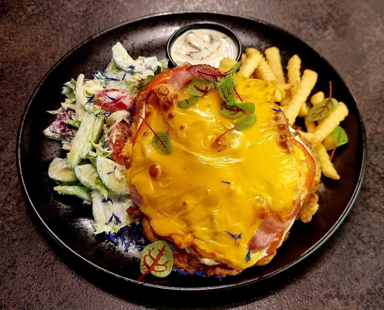 Imperial pork chop with cheese and bacon