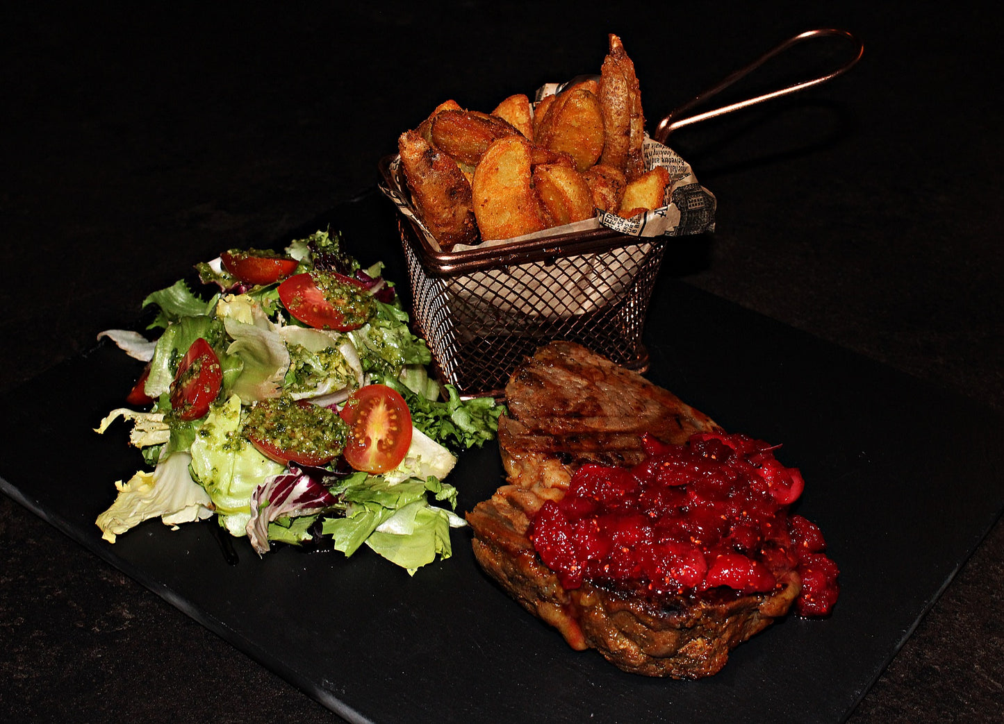 Beef steak (well-done) with salad, side dishes and sauce of your choice