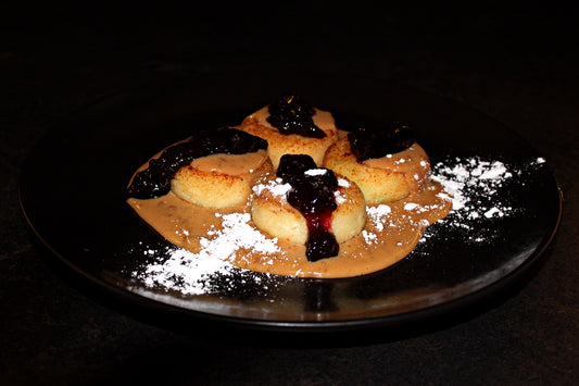 Cottage cheese scones with boiled condensed milk mousse and blackcurrant jam