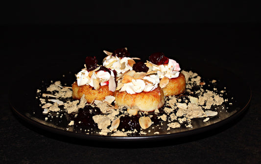 Cottage cheese scones with cream cheese, almond flakes, halva and cherry/cranberry jam